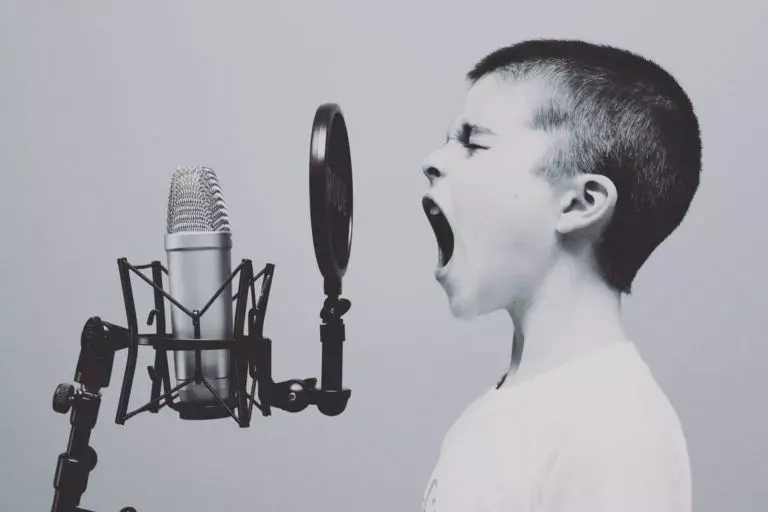 A funny image of a child as a voice-over actor