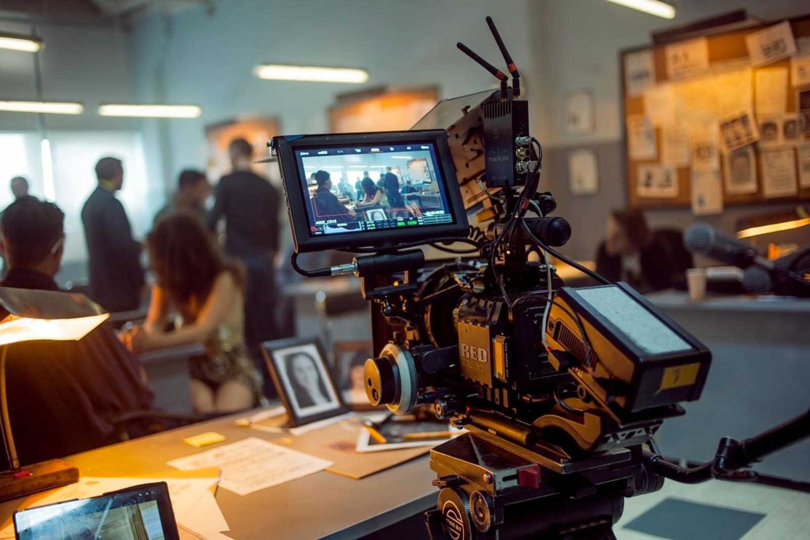 A producer's desk featuring filmmaking equipment demonstrating Filmmaking in the UK