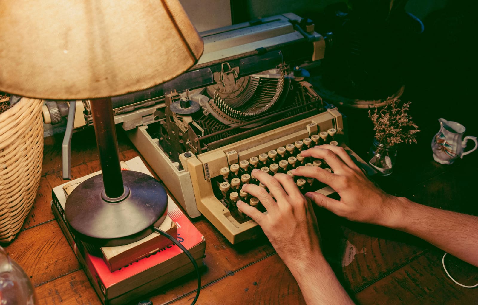 Screenwriter working on a script while analysing dialogue and character emotions, representing why subtext is one of the most powerful tools in screenwriting.